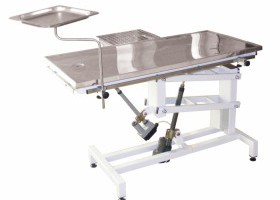 Elektrický operační stolek s odtokovým otvorem a naklápěcí deskou